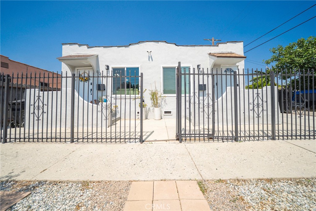 Proudly presenting 8217–8219 Towne Avenue, a meticulously upgraded and centrally located duplex DELIVERED COMPLETELY VACANT—ideal for both savvy investors and owner users. Situated in the heart of Los Angeles, this well maintained property showcases pride of ownership and an excellent value-add opportunity with ADU potential in the spacious detached two-car garage.The front unit, 8217, has been extensively renovated with all-new lumber and drywall, updated electrical and plumbing systems, energy-efficient double-pane windows, and new insulation throughout the walls and roof. The interior boasts custom kitchen cabinetry with granite countertops, a fully remodeled bathroom, laminate flooring, washer/dryer hookups, and a powerful mini-split AC system for year-round comfort. The rear unit, 8219, mirrors the high-end finishes with matching custom kitchen cabinets, granite counters, dual-pane windows, mini-split AC, and in-unit laundry connections. Both units are bright, clean, and completely move-in ready—offering immediate flexibility for rental income, multi-generational living, or house hacking.To top it off, the detached two-car garage presents a prime opportunity for an additional income-producing unit or guest house with ADU conversion potential (buyer to verify). Properties like this vacant, upgraded, and with expansion upside
rarely hit the market.