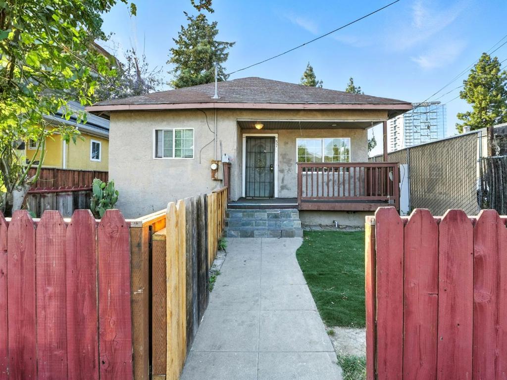 Lowest priced Single Family Home with ADU in San Jose! Amazing opportunity to own TWO units in the heart of Silicon Valley. The main home offers 2 bedroom, 1 bathroom and utility room with indoor laundry. Detached, permitted ADU offers 2 bedrooms and 1 bathroom. Deep driveway accommodates multiple or oversize vehicles and a covered carport. This diamond in the rough is fully vacant making it the perfect blank canvas for a great long term investment or for anyone looking to live in one unit and rent the other. This property is located in Downtown San Jose for convenient and easy access to dining, entertainment, shopping, and all major attractions like San Pedro Square, Japantown, SAP center, Children's Discovery Museum, Sharks Ice Skating Venue, SJSU and more! Easy access to all major freeways make any commute a breeze!