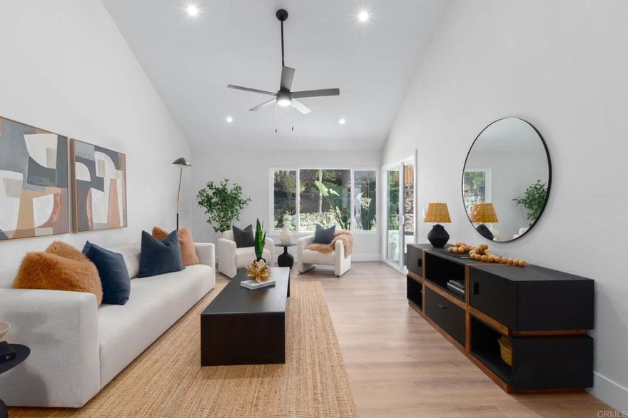 Nestled in the heart of Poway, this beautifully remodeled 3 bedroom, 2 bath home has so much to offer. The interior features modern finishes throughout, including new flooring, recessed lighting, a stunning kitchen with all new appliances and cabinetry, and newly-renovated bathrooms with glass shower doors. Take in the gorgeous backyard views from the primary bedroom and living room, where the over-sized windows and vaulted ceilings flood the space with light. Entertain year-round in the resort-like backyard, where you'll enjoy the heated pool, hot tub and mature landscaping. A large two-car garage and shed provide plenty of space for storage.  Located in the highly sought after Poway Unified School District, you'll have easy access to shopping, dining, and top-rated schools. You’re also close to incredible hiking destinations including Iron Mountain Trail and the iconic Potato Chip Rock. This home is truly a gem!