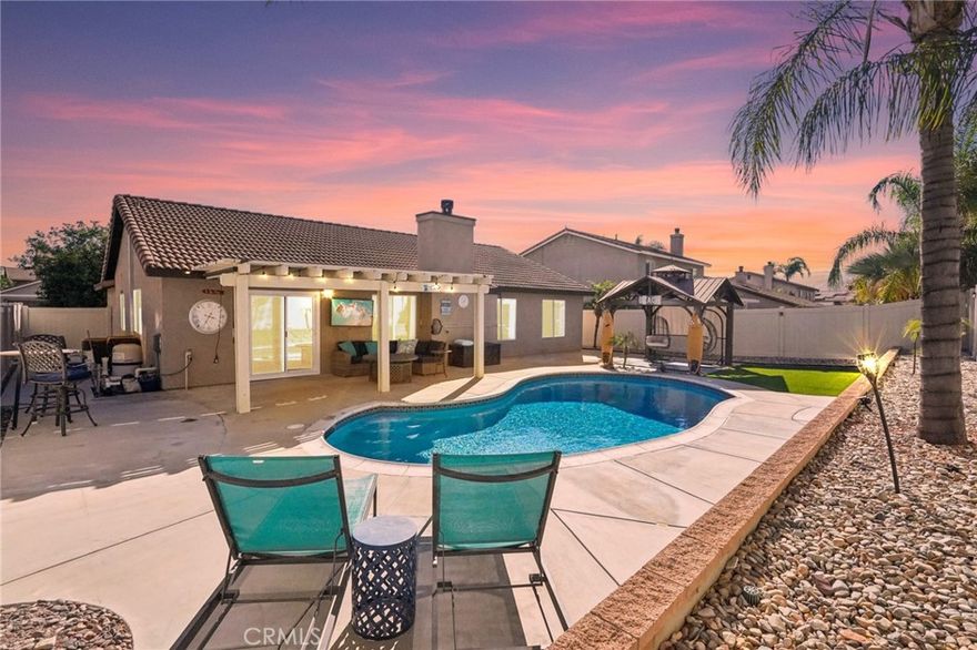 Gorgeous Single-story 4-bedroom Pool home with PAID-IN-FULL SOLAR (19 panels), NO HOA and LOW TAXES! Immaculate and truly move-in ready, this showplace features an open-concept layout with a grand entry flowing into a spacious great room that connects seamlessly to the upgraded kitchen with new granite countertops and ample cabinetry. The sought-after split floor plan places the primary suite on one side and three secondary bedrooms on the other for privacy and convenience.



The primary bath shines with a brand-new shower enclosure, an upgraded dual vanity with newer fixtures and designer lighting, dual sinks, and a separate soaking tub. Stylish tile and luxury vinyl plank flooring throughout—no carpet. Additional highlights include a beautifully sized laundry room, new AC, and all appliances included.



Step outside to a resort-style backyard made for entertaining: a sparkling saltwater pool, Alumawood patio cover, and a tiki-style gazebo create multiple zones to relax, dine, and host. Fantastic Wildomar location close to schools, restaurants, and shopping, with easy 15-freeway access for commuters. This is the single-story, upgraded, solar-powered pool home you’ve been waiting for—make it yours today!