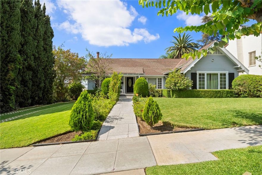 Welcome to 5827 Washington Ave., a rare single-level vintage beauty set on an oversized lot in one of Uptown Whittier’s most coveted neighborhoods. With stunning curb appeal and timeless architecture, this home exudes warmth and character while offering modern upgrades for today’s lifestyle.



Step inside to discover hardwood floors that flow seamlessly throughout the entire home, connecting the spacious living room, family room, and formal dining area in a warm, elegant layout. The oversized kitchen includes a sunny breakfast nook and a convenient laundry room, while three generously sized bedrooms—including a serene master suite—offer comfort and style.



Built with both security and quality in mind, the home has been retrofitted with top-of-the-line materials and craftsmanship. Modern conveniences include a brand-new whole-home water filtration system and water softener.



The unique U-shaped design allows nearly every room to open through French doors to a tranquil courtyard, perfect for indoor-outdoor living. The resort-style backyard features low-maintenance turf, a sparkling pool, and multiple entertaining spaces, while the deck offers breathtaking sunset views over the Whittier Hills. The front yard provides a generous grassy area, ideal for play, gardening, or simply enjoying the outdoors.



Additional highlights include an oversized garage with abundant storage and workspace potential, perfect for car enthusiasts, hobbyists, or anyone needing extra space.



Just steps from Hellman Trail and minutes from Turnbull Canyon, outdoor recreation is at your doorstep. Walk to Uptown Whittier’s restaurants, coffee shops, parks, movie theater, and bookstore.



5827 Washington Ave. is more than a home—it’s a retreat, a lifestyle, and a rare opportunity to own a piece of Uptown Whittier charm.
