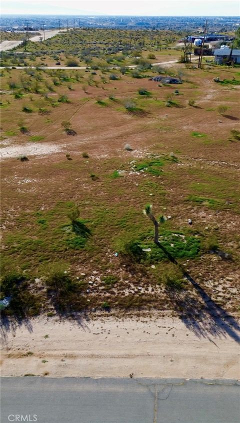 Photo of 11300 Merino Avenue, Apple Valley, CA 92308 (MLS # IG26042141)