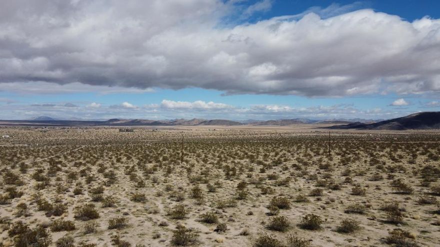 Massive Price ReductionInvestment Opportunity - 30-Acre Prime Parcel with Seller Financing Available!Unlock the potential of this exceptional 30-acre parcel, ideally suited for residential, commercial, multifamily, hospitality, storage, or solar farm development. With expansive highway frontage along Highway 62 extending to Sullivan Road, this property offers unmatched visibility and accessibility on the highly desirable mountain side of the route.Key HighlightsPrime LocationBorders Joshua Tree National Park, offering breathtaking views of the JT Monument, valley below, snowcapped San Andreas and Big Bear Mountains and direct views of Copper Mnt.Minutes from local boutiques, dining, and essentials in Yucca Valley; Palm Springs is a short drive away.Approx. 2-hour drive from Los Angeles--an ideal balance of accessibility and tranquility.Development PotentialZoning: RS1 & RL2.5, permitting development on lots as small as 1 acre.County allows one main dwelling + up to 2-3 ADUs per parcel.Subdivision plans underway to create 10 separate parcels.Ideal for a community, resort, or investment subdivision.Infrastructure & FeaturesHighway frontage includes water access & power poles.Additional services via Sullivan Rd & Cottonwood Rd.Gentle slope with 150 ft elevation gain ensures excellent buildable terrain.Minimal Joshua Trees--no significant development restrictions.Due Diligence Completed$16,000 Survey and $3,500 Geological Study completed.Positive feedback from county officials regarding development opportunities.Basic building plans available upon request.Flexible TermsSeller open to partial or full sale.Seller financing available.This is one of the last large parcels in this highly sought-after area--a rare opportunity for visionary developers or investors to create a distinctive retreat or thriving community.Location Name: Northeast CornerLatitude: 34.127939Longitude: -116.240501Address: 65196 Sullivan Rd, Joshua Tree, CA 92252, USAGoogle Maps: https://maps.google.com/maps?q=34.1279387%2C-116.2405006Waze: https://waze.com/ul?ll=34.1279387%2C-116.2405006&navigate=yesLocation Name: Southeast CornerLatitude: 34.127901Longitude: -116.242244Address: 65118 Sullivan Rd, Joshua Tree, CA 92252, USAGoogle Maps: https://maps.google.com/maps?q=34.127901%2C-116.2422439Waze: https://waze.com/ul?ll=34.127901%2C-116.2422439&navigate=yesLocatio