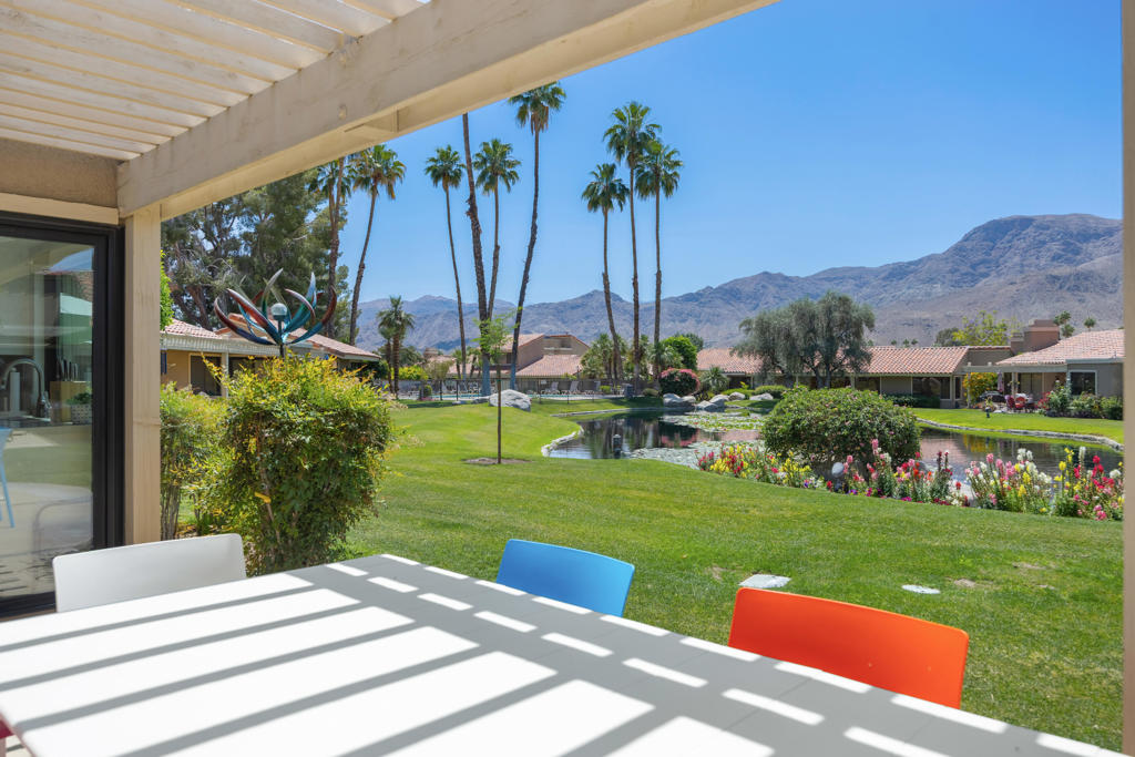 Experience luxury desert living in this beautifully updated 3BD/2BA, offering 1,899 SQ FT of sleek and modern design. Nestled in the heart of Rancho Mirage, this elegant home boasts breathtaking mountain and tranquil lake views from multiple vantage points. The spacious open-concept layout is perfect for entertaining or relaxing, featuring modern finishes, vaulted ceilings, and abundant natural light that flows throughout. Stylish interiors blend seamlessly with the serene outdoor surroundings. Located within a secure, gated community, residents enjoy access to exceptional resort-style amenities including sparkling community pools and spas, lush landscaping, and meticulously maintained tennis courts. Whether you're seeking a full-time residence or a seasonal getaway, this condo combines comfort, convenience, and sophistication in one of the desert's most desirable and scenic locations.