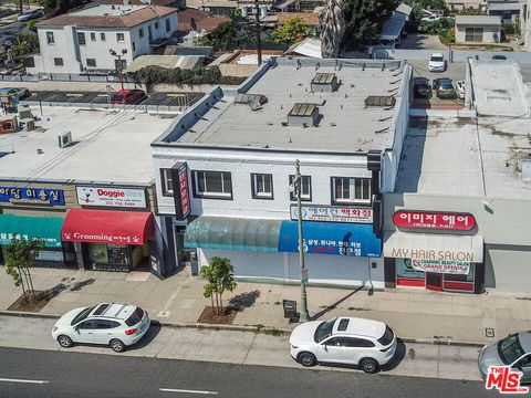 Photo of 4015 W OLYMPIC Boulevard, Los Angeles, CA 90019 (MLS # 25613203)