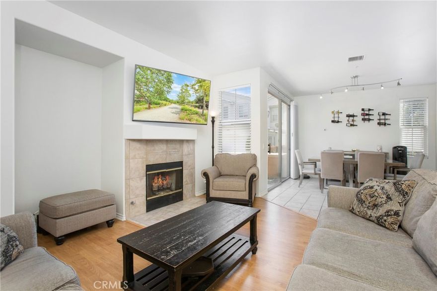 This large end unit condo in the gated community of Cambridge II features a great room floorplan with a spacious kitchen that opens to a dining room and family room. There a plenty of windows that provide great natural light throughout the day, giving a light and open feel to the home. Grill a feast on the large patio which opens to the dining area and host summer dinner parties with friends in your own indoor/outdoor space. This unit is just around the corner from the pool and spa so it’s a short walk but none of the noise and traffic. With the open kitchen design, the chef can be a part of the action while guests mingle or family relaxes nearby in the living room. Spend cool winter evenings cozying up in front of the fireplace in the living room which has room for a large flat screen. Upstairs the spacious loft area is an understated space that can be turned into an additional TV or study room. It leads into the oversized bedrooms and really makes the upstairs feel more spread out and private. The spacious master bathroom features a large tub, standup shower, dual sink vanity, and a spacious walk-in closet. Evening strolls to nearby Grijalva Community Park are great for unwinding after a long day while the playground and lawns are perfect for letting the kids play on a weekend morning. Spend lazy summer days lounging in the community pool or relax in the community hot tub. The laundry room is located inside adjacent to the kitchen and leads into the direct access 2 car garage with high ceilings that are perfect for adding storage racks.