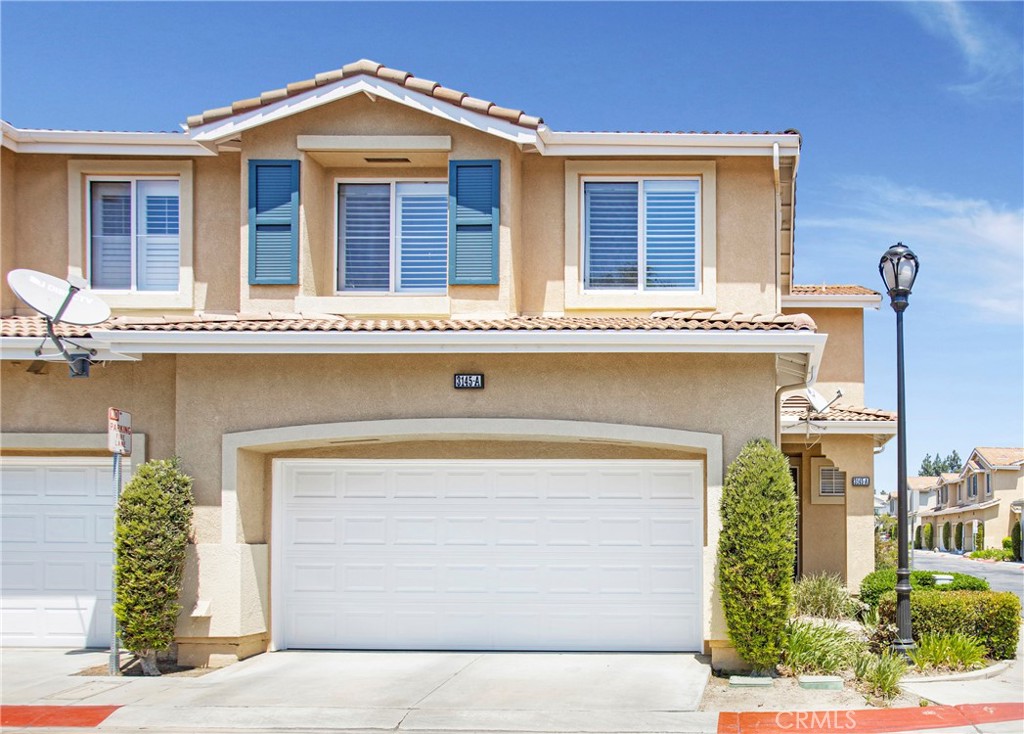 This large end unit condo in the gated community of Cambridge II features a great room floorplan with a spacious kitchen that opens to a dining room and family room. There a plenty of windows that provide great natural light throughout the day, giving a light and open feel to the home. Grill a feast on the large patio which opens to the dining area and host summer dinner parties with friends in your own indoor/outdoor space. This unit is just around the corner from the pool and spa so it’s a short walk but none of the noise and traffic. With the open kitchen design, the chef can be a part of the action while guests mingle or family relaxes nearby in the living room. Spend cool winter evenings cozying up in front of the fireplace in the living room which has room for a large flat screen. Upstairs the spacious loft area is an understated space that can be turned into an additional TV or study room. It leads into the oversized bedrooms and really makes the upstairs feel more spread out and private. The spacious master bathroom features a large tub, standup shower, dual sink vanity, and a spacious walk-in closet. Evening strolls to nearby Grijalva Community Park are great for unwinding after a long day while the playground and lawns are perfect for letting the kids play on a weekend morning. Spend lazy summer days lounging in the community pool or relax in the community hot tub. The laundry room is located inside adjacent to the kitchen and leads into the direct access 2 car garage with high ceilings that are perfect for adding storage racks.