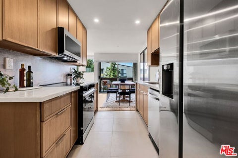Photo of 6050 Canterbury Drive #E313, Culver City, CA 90230 (MLS # 26991631)