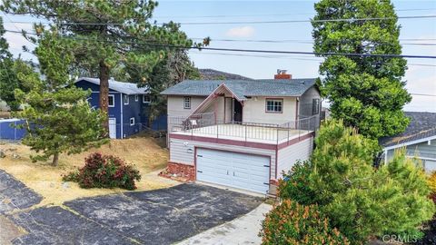 Photo of 5534 Easter Dr, Wrightwood, CA 92397 (MLS # HD26099509)