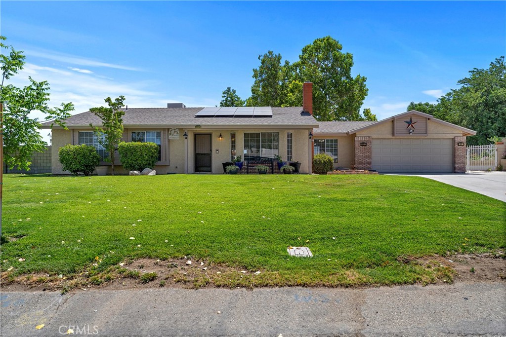This beautifully maintained single-story home offers 3 bedrooms, 2 bathrooms, plus a bonus room perfect for an office or craft space. Recent upgrades include a new roof, new flooring, and paid-off solar. Sitting on a spacious, fully fenced and cross-fenced lot, the property is ideal for privacy, pets, and small farm living. Enjoy a dog run, gazebo with storage, greenhouse, shop with 220V power, playhouse, and fruit trees. The front and rear yards are beautifully landscaped, creating a peaceful outdoor retreat. This move-in ready home is the ideal blend of comfort, convenience, and country living!