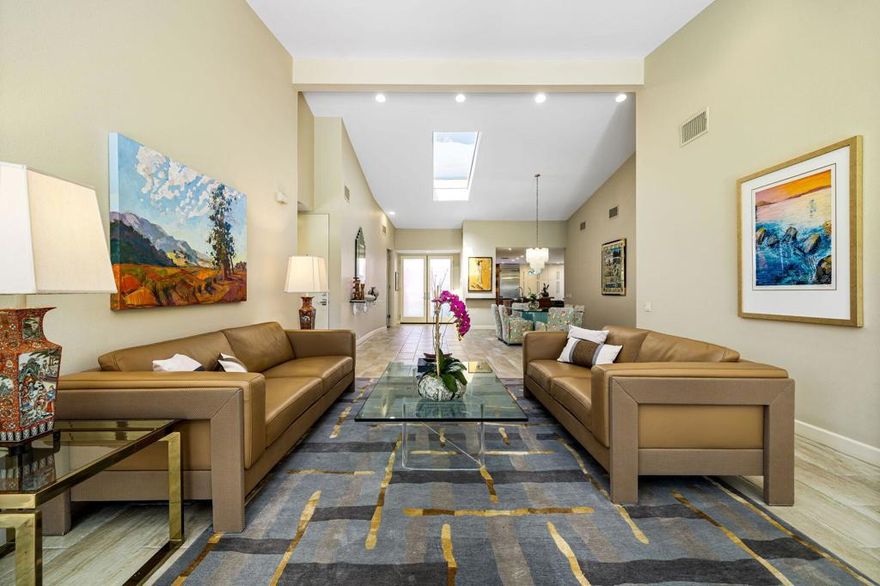 Price Adjustment $100,000. Fabulous South-facing, uniquely Upgraded Golf Course Home with stunning double-Fairway and dramatic Mountain Panoramas! Sophisticated style flows throughout this charming residence, enriched with warm tones, and designer uses of tile, granite, and stone. Enter through a private gated courtyard into an inviting, entertainer-friendly layout featuring soaring ceilings, gleaming tile floors, and expansive picture windows that frame the exceptional views. The open Great Room offers a cozy Fireplace and step-down wet bar--perfect for gatherings. The upgraded expanded Chef's Kitchen is designed for the culinary enthusiast, showcasing Thermador Stainless Appliances, rich wood cabinetry, granite surfaces, and a wine cooler. The Primary Suite is a serene retreat with walk-in closet, spa-style bath, and gorgeous views through sliders and windows. A 2nd en-suite Guest Suite provides comfort and Views while the 3rd Guest Suite--currently used as an office--offers its own sliders to the patio and an en-suite bath. Step outside to the ultimate entertainer's patio with unobstructed South views of Eisenhower Mountain and the double fairways. Dramatic landscape lighting sets the perfect ambiance for Fabulous Sunset Desert Evenings! Additional features include a 2-car garage plus golf cart garage. True desert living at its finest! Newly Updated Desert Horizons Country Club--home to world-class amenities; Dining, new Courts Pavilion with 11 Pickleball Courts, State-of-the-Art Fitness & Wellness Center, private 18-Hole Golf Course, and an exciting calendar of social events.