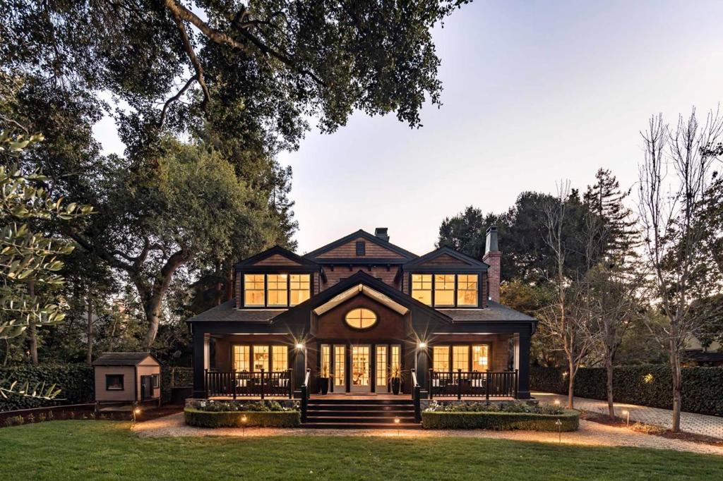 Luxe Rustic Vibe in West Atherton. Located in a prestigious community, this 6 bedroom, 4 full, and 2 half-bath estate of 4,613 square feet (per county) infuses high-end designer styles with rustic, Tahoe-inspired luxury. Enter through the private front gate past the sprawling front lawn. The open-concept interior is bathed in ambient natural light with expansive windows at every turn. Oak floors carry through the formal gathering rooms, full in-law suite, and outstanding chefs kitchen that overlooks the charming patio and pool. The upstairs family room gives way to additional suites, including the ultra-refined master with two walk-in closets, electric heated marble floors, and a steam shower. Enjoy strolling to downtown Menlo Park, Holbrook-Palmer Park, Facebook headquarters, esteemed private schools, and more just minutes from this central yet exclusive setting.