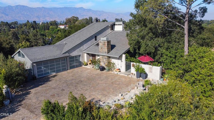 Nestled at the tranquil end of a cul-de-sac, 1344 Marianna in Pasadena blends modern updates with timeless charm. This stunning multi-level home offers ample parking and panoramic views of Johnson Lake. Floor-to-ceiling windows throughout fill the interiors with natural light, including the vaulted, wood-paneled living room with a striking mosaic-tiled fireplace. The dining areas open to a lush patio and tree-filled landscape, blurring the line between indoors and out. The chef's kitchen, open to a cozy family room, features high-end stainless appliances, a large island, and generous storage. The master suite is on the main floor, while additional bedrooms provide peaceful retreats--one with a private balcony, another with elegant hummingbird art. Updated bathrooms showcase modern fixtures, and a loft overlooking the living room offers an ideal home office or creative space. Designed for both entertaining and quiet relaxation, the home is offered partially to mostly furnished, allowing for a seamless transition. Pristine condition, thoughtful updates, and curated furnishings make this an exceptional Pasadena rental.