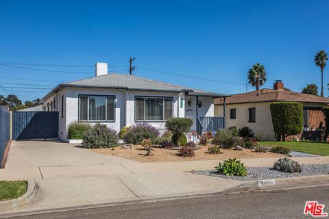 Photo of 9806 S Van Ness Avenue, Los Angeles, CA 90047 (MLS # 25597651)