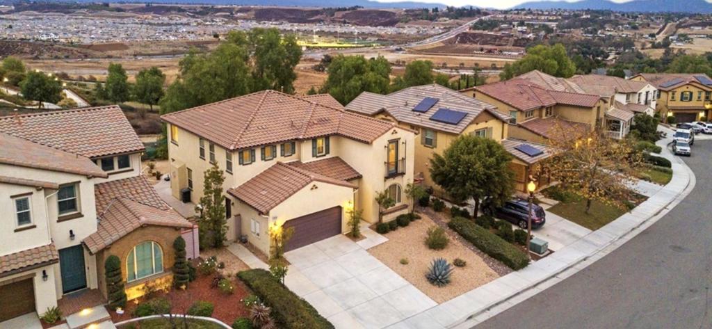 Nestled in the exclusive gated community of Roripaugh Ranch, this 3,240 square foot gem offers the perfect blend of elegance, comfort, and privacy. With 4 spacious bedrooms and 3 1/2 bathrooms plus large loft. This exceptional home boasts extensive eastern views overlooking the rolling hills of Temecula Wine Country. Downstairs bedrooms with a full bath and a 3 car garages. The kitchen boasts a large center island, 5-burner gas range, large walk-in pantry, stunning counters, double oven and rich cabinets. Roripaugh Ranch offers top-notch amenities including a clubhouse, pool, main park, toddler park, walking trail, tennis/pickleball courts and 24-hour gym perfect for an active lifestyle. Situated in the heart of Temecula, you're just minutes away from renowned wineries, restaurants, convenient grocery stores and amazing schools. The buyer and buyer’s agent should be verify all measurements.
