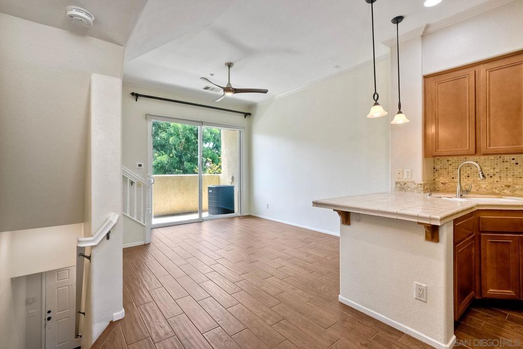 Rarely available 3-story townhome in Corte Bella gated complex of Coronado Ranch, less than 1 mile from CSU San Marcos. New carpet and paint throughout. This two bedroom, two and a half bath townhome features hardwood floors on main floor, 2 primary suites on upper level, A/C, and 1-car garage equipped with washer and dryer, PLUS one extra large additional assigned parking space. Tenants will have access to a variety of community amenities including a clubhouse with pool, spa and playground. No smoking. Smaller dogs will be considered. The main living area features an open floor plan with the living room, dining room, and kitchen sharing the space, plus half bath. The kitchen features stainless steel appliances, a custom backsplash, and a peninsula that can be used as additional seating. A private balcony faces a quiet open park space in front of the home. Credit and background check required with on-line application via Rent Spree after in-person or virtual showing of property. Security deposit is required of at least $2400 depending on credit to be paid plus 1st month's rent prior to move in. Gross income equal or greater than 2.5X rent is required for single tenant, 3X rent for 2 tenants, 4X rent for 3 tenants, etc. Tenant pays for utilities: Electric, gas, water, cable, wifi as needed. Owner pays trash collection and common area fees.