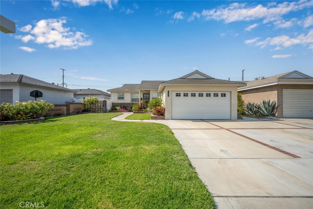 Entertainer's Dream with Pool & Spa. Beautifully remodeled TURN KEY single-family home centrally located in Bellflower. Kitchen with stainless appliances, recessed lighting, stone counters and a eat in area. Living room with fireplace overlooks backyard retreat. Bedrooms with open windows overlook backyard. Wood flooring flows throughout the home, complemented by smooth ceilings, crown molding, central AC, replaced windows that fill each room with natural light. Outdoors, enjoy your very own backyard retreat complete with sparkling pool and spa, covered patio with ceiling fan, and a bar counter with sitting area and refrigerator. An additional covered area is a great place to hangout for a break from the sun. Turf inlay, private outdoor shower and changing area make this yard complete. Boxed eves, automatic sprinklers and a 2 car attached direct access garage. This home blends comfort, style and functionality in a great neighborhood- ready for you to move in and enjoy.