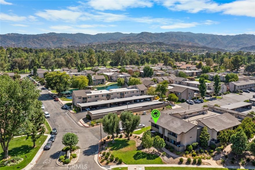 Wow! Honey..., STOP THE CAR...!!! This 1-bedroom, 1-bathroom condo with lots of open space for your enjoyment. It offers 750 square feet of living space. (Buyer to do their research on sqft.). The condo features an open kitchen with a bar, while central air and heat ensure year-round comfort. The community amenities include a shared laundry room, pool, tennis courts, basketball courts, a nearby golf course, and a playground. This home offers peaceful living and easy access to local shops, dining, and entertainment. Don't miss the chance to make this your new home!