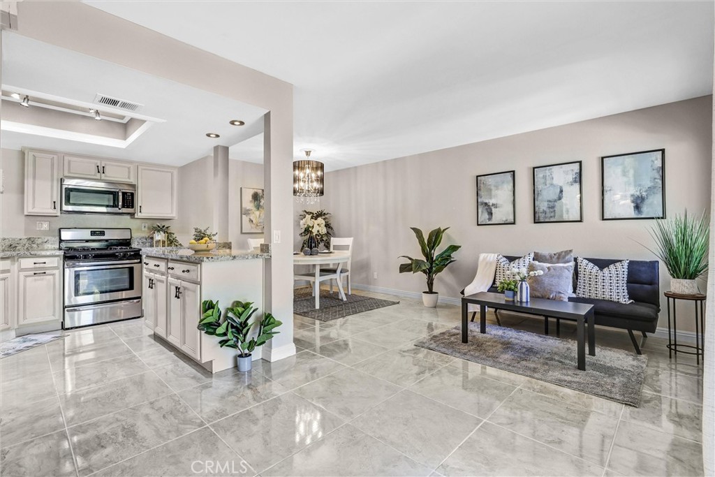 Welcome to this charming 2-bedroom, 1-bath ground-level condo in the serene Villa Mira community. With nearly 800 sq ft of thoughtfully designed living space, this home offers an open-concept layout, central A/C and heat, in-unit laundry, and a private patio—perfect for relaxing or entertaining. The patio offers total privacy from away from other units. The patio can be accessed from the main living area and also from the secondary bedroom. Enjoy access to community amenities including a pool and spa, all just minutes from shopping, dining, parks, and the beach. Ideally located near Cabot Road and Paseo del Colinas, with convenient freeway access.