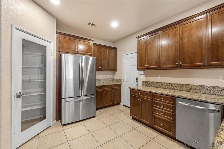 Charming 3bed, 3bath townhome with optional 4th bed/office/gym on the 1st floor & full bath. Stylish kitchen features stainless steel appliances & sleek counter tops opening to a bright dining/living area with fireplace & access to a backyard boasting the best views of Otay Ranch! Spacious primary suite offers a walk in closet & double vanity ensuite, 2 other bedroom's upstairs also. Just a 10-min walk to Otay Ranch Town Center with great food & Shopping. Community perks include pool & great amenities!  Buyers & buyers agent to verify all herein prior to submitting an offer!