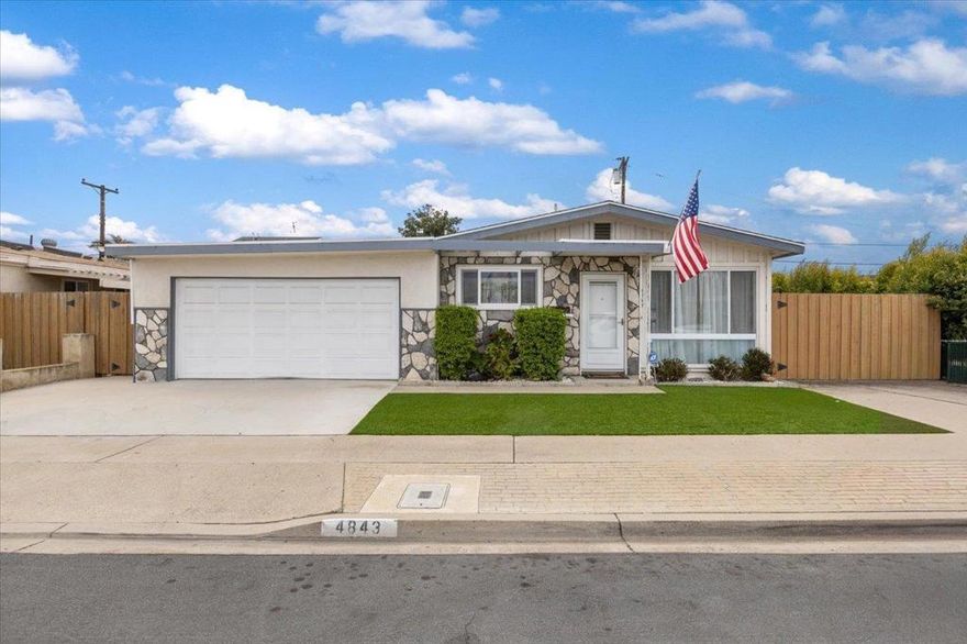 Beautifully maintained single-level home in North Clairemont with great curb appeal, rare parking for a boat or RV, an expansive backyard, & A/C! This lovely property has been lovingly cared for & is now ready for its next chapter. Step inside to lots of light, charming details, great craftsmanship, & a flowing floor plan with the living room, dining room, & kitchen separated from the home's 4 generous bedrooms. The kitchen was previously updated with granite counters, gorgeous wood cabinetry, & lots of storage. A fully permitted bonus room was added, increasing the square footage of the original home & adding extra functionality as a family room, den, craft space, game room, studio, or office. Featuring beautiful wood-beamed ceilings & a stone-surround fireplace with heatilator, this room is filled with possibilities! All of the secondary bedrooms are spacious & light-filled. The primary suite showcases dual closets & an ensuite bathroom for additional privacy. A full bathroom in the hallway completes the interior. Outside, the backyard includes a covered patio area, a magnificent grass lawn, mature landscaping, & dedicated parking for a boat/RV/trailer that is accessible from the street through a separate gate. No HOA & no Mello-Roos! A short walk to Hawthorne Elementary. Close to all of the incredible restaurants, shopping, & entertainment options in Clairemont & the surrounding neighborhoods, plus you'll be just a short drive to freeways, beaches & Downtown San Diego. Don't miss this one!