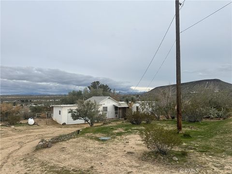 Photo of 55710 Chaparral Rd, Yucca Valley, CA 92284 (MLS # IV26004895)