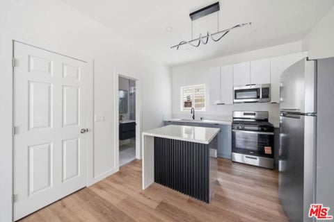 Photo of 3026 W 12th Street #1/2, Los Angeles, CA 90006 (MLS # 26102034)