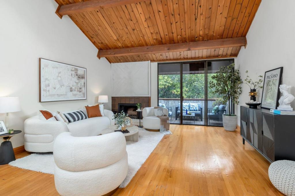 Welcome to this beautiful 2-bedroom, 2.5-bath townhome in the desirable San Mateo Highlands near Crystal Springs Reservoir. It features soaring wood-paneled ceilings with exposed beams and skylights, freshly painted walls downstairs, and brand-new carpet throughout.The spacious living and dining area opens to a large private patioperfect for afternoon tea or summer BBQs. Downstairs, the primary suite includes a private balcony, the perfect spot for your morning coffee. The second bedroom works beautifully as an office, kids room, or guest room.This home offers the best of both worlds: the serenity of being surrounded by nature and the convenience of Mid-Peninsula living, with endless shopping, dining, arts, and entertainment options, as well as top schools, and medical centers. Conveniently close to Hwy 280/92/101, the tech corridor, SFO, College of San Mateos world-class farmers market, Laurelwood, Crystal Springs, hiking trails, restaurants, and shops! The HOA provides access to a resort-style pool, hot tub, and tennis courts.