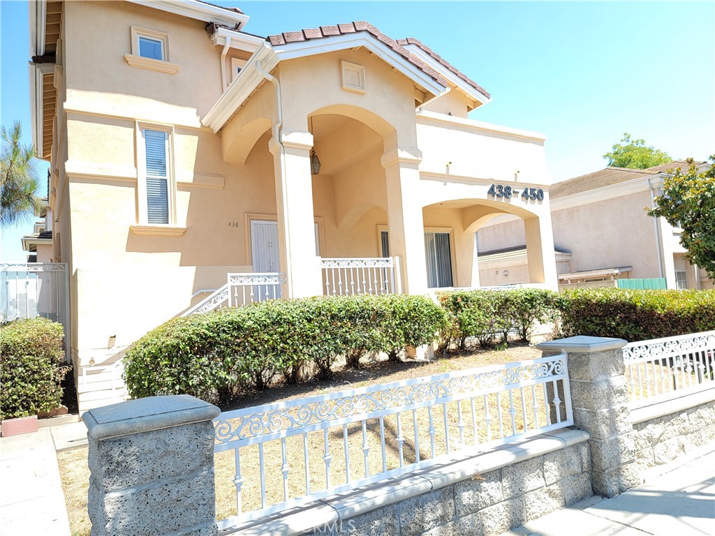 Welcome Home! This gorgeous two-story single-family home is ideally situated in a prime neighborhood, tucked behind a wrought-iron fence that adds elegance and privacy. A stately front porch, framed by two charming arches, leads you to the welcoming entryway. The home features four bedrooms and three full bathrooms, with a fresh interior and exterior paint job. Three bedrooms are located upstairs, including a spacious primary suite with its own full bathroom and a sunny private balcony. A generously sized bedroom with a full bathroom is located on the first floor—perfect for use as an in-law suite, a guest room, or private quarters for extended family. The bright and airy living room is centered around a cozy gas fireplace, creating a warm and inviting ambiance. A formal dining room sits adjacent to the fully equipped kitchen, which boasts granite countertops and a bay window that fills the space with natural light. Just beyond the dining area, a large balcony provides the perfect setting for outdoor entertaining or peaceful morning coffee. Throughout the home, rich wood flooring adds warmth and sophistication. A ceiling-mounted fire sprinkler system offers proactive fire protection for added peace of mind. The expansive three-car attached garage includes built-in shelving, a lighted storage room, and a laundry area complete with a wash basin. The shared community driveway is secured by an electric gate, offering added privacy and peace of mind. Nestled in the heart of the San Gabriel Valley, Monterey Park blends suburban tranquility with urban convenience. The city's lively commercial districts along Atlantic Boulevard and Garvey Avenue are celebrated for their world-class Asian cuisine, bustling local markets, boutique shops, and salons. Monterey Park boasts several parks—Barnes Park, Sequoia Park, and Garvey Ranch Park—providing abundant green space for outdoor recreation and family activities. The community comes together throughout the year for popular events such as the Lunar New Year Festival, Cherry Blossom Festival, Geranium Festival, and Cinco de Mayo Celebration. Its central location offers quick access to Downtown Los Angeles, Santa Monica, and the San Fernando Valley, with convenient travel options via Hollywood Burbank ( Bob Hope), Ontario International, and LAX airports. Monterey Park is also known for its top-rated public schools and a strong sense of safety, thanks to excellent police and fire services.