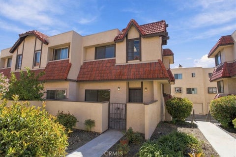 Photo of 27623 Nugget Drive Dr #4, Canyon Country, CA 91387 (MLS # SR26217167)