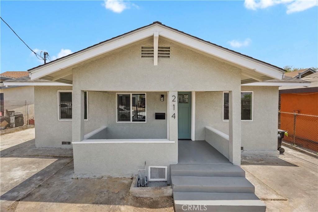 This stunning 3-bedroom, 2-bathroom home has been completely remodeled and is move-in ready for you today! This beautifully reimagined single-family home offers a thoughtfully designed layout that is sure to impress. The home features brand-new laminate flooring throughout, new dual pane windows to fill the home with natural light, enhancing a bright and welcoming atmosphere. The kitchen is a chef's dream, showcasing brand-new quartz countertops, ample cabinetry, stylish backsplash, and plenty of space for culinary creativity. 3 spacious bedrooms offer both comfort and practicality and includes new ceiling fans. With 2 full size bathrooms: one in the primary bath with a walk in shower and a hallway bath with custom vanities, decorative tiles, and modern finishes. Other notable features include dedicated laundry area with hookups inside, New roof, Newly rewired electrical, Newly painted exterior with cute front porch, and ample driveway parking with gates for added safety. Conveniently located near shopping/restaurants and with easy freeway access to Downtown, this home truly has it all. Don’t miss out!
