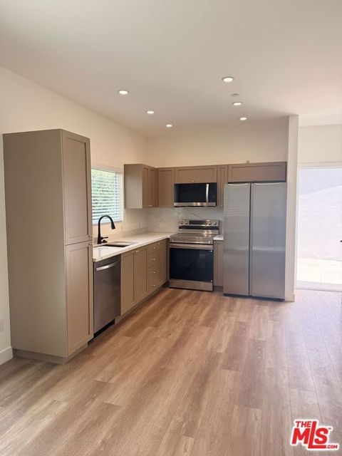 Photo of 6626 Woodlake Avenue, West Hills, CA 91307 (MLS # 26854591)