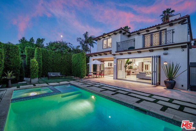 Step into this Contemporary Spanish home with your luggage! Centrally located in Beverly Hills / West Hollywood neighborhood steps away from the popular shops, restaurants, nightlife and local hotspots including Restaurant Row, Rodeo Drive, Beverly Center and the Grove. Open floor plan with kitchen and Living room opening to the backyard with an inviting salt water swimming pool and Jacuzzi. Beautiful Italian kitchen with all Viking appliances. 5 bedroom In-suites. Master bedroom has a good size balcony overlooking the Pool. Master bath with steam shower, claw foot soaking tub and walk-in closet. The home is pre-wired for smart home system. AVAILABLE FURNISHED!