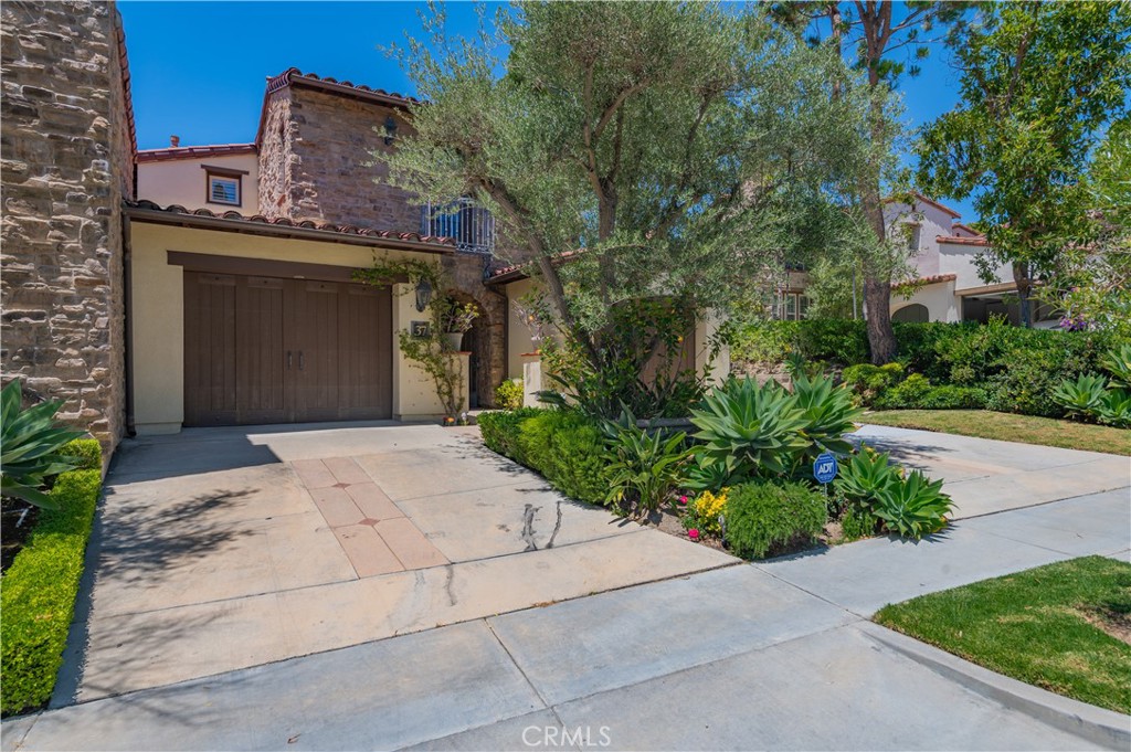 Available furnished or unfurnished. Experience timeless elegance and luxury in this stunning estate, set on an expansive, nearly 9,000 square foot lot. Thoughtfully designed with both beauty and function in mind, this home features two separate one-car garages framing a serene, landscaped front courtyard — offering a grand sense of arrival and added privacy. One of the most distinctive highlights is the seperate guest suite located just off the courtyard. With its own private entrance and en-suite bathroom, this space is ideal for extended family, visiting guests, or even a home office — providing exceptional flexibility while maintaining privacy from the main home. Step inside and you'll be greeted by a classic, wood-accented traditional interior — warm, inviting, and rich in character. The main level boasts an open-concept layout with a gracious living room, formal dining area, and a gourmet kitchen that seamlessly flows for effortless entertaining. Upstairs, a spacious loft offers a versatile second living space — ideal for a media room, study, or play area. The luxurious primary suite feels like a private retreat, complete with a separate lounge/sitting area, as well as scenic views. Two additional bedrooms upstairs are generously sized and thoughtfully designed for comfort. Located within the prestigious gated community of Turtle Ridge, residents enjoy exclusive access to resort-style amenities including clubhouse, pool, spa, fitness center, and beautifully maintained grounds — all secured by 24-hour guard-gated entry for peace of mind. With its refined traditional styling, exceptional layout, private guest quarters, panoramic views, and access to world-class community amenities, this remarkable home is available furnished or unfurnished — offering a rare opportunity to enjoy the best of luxury living in one of Irvine’s most sought-after neighborhoods.