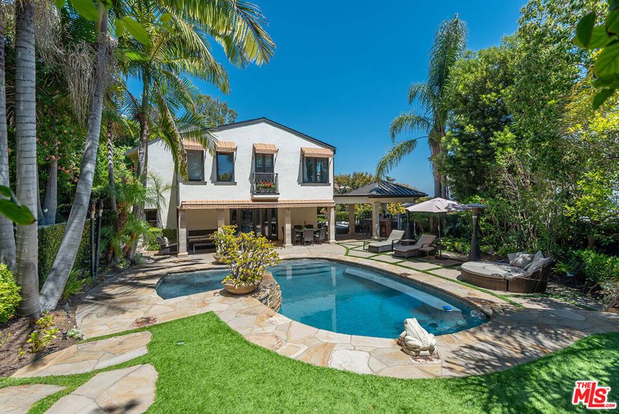 Home is available mid December.  Thoughtfully updated and fully furnished 5-bedroom, 4.5-bath house located above Sunset Boulevard in West Hollywood. Set on a rare double lot of over 10,000 sq ft, the home spans 3,629 sq ft and offers sweeping city views with complete privacy. Designed for seamless indoor-outdoor living, it features a chef's kitchen with premium appliances, a wine fridge, and a breakfast bar, opening to a series of inviting living and dining spaces. The primary suite includes two walk-in closets, a spa-inspired bath, and a balcony with panoramic views. A junior en-suite and two additional bedrooms complete the upper level, while the lower level hosts a fifth en-suite, wine cellar, and flexible space for a gym or office. Outside, a pool, spa, fire pit, built-in BBQ, and gazebo bar create an ideal setting for entertaining.  Will consider shorter term lease; minimum 3 months, call for pricing.