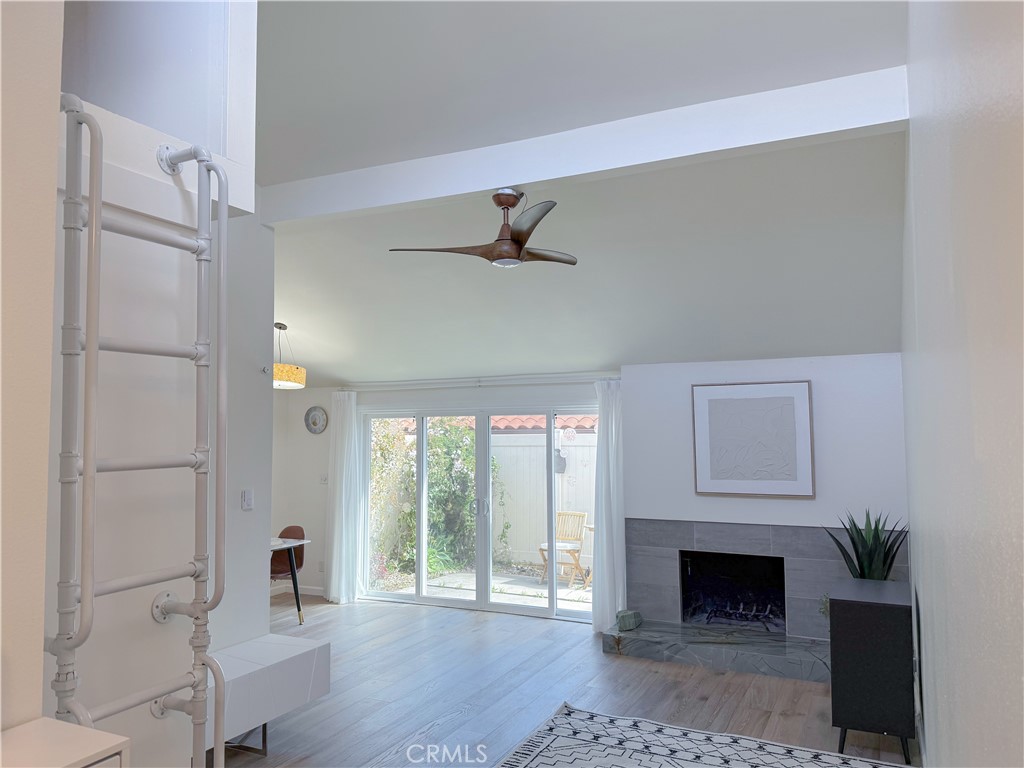 Welcome to One of the Most Charming Hidden Gems in the Area – Where Style Meets Serenity
Don’t miss your chance to own one of the most distinctive and peaceful homes in the community. To call this residence merely a “townhome” doesn’t quite do it justice—it offers the comfort, character, and privacy of a single-family home with the ease and convenience of a well-maintained complex.
Privately tucked away in the most secluded corner of the development, this light-filled end unit enjoys a unique layout with no neighbors above, below, or directly beside—an uncommon and highly desirable feature that gives this home an unmatched sense of tranquility and space.
Step inside and you’ll immediately notice the vaulted ceilings, French oak-style floors, and natural light pouring through oversized windows. The open-concept living area invites you in with a cozy fireplace, perfect for cool evenings or intimate gatherings. A loft-style bonus area overlooks the living room—ideal as a home office, reading nook, or creative space.
The kitchen is a true showpiece, with clean white cabinetry, gorgeous quartz countertops, stainless steel appliances, and ample space for cooking and entertaining. Just off the kitchen, the private patio offers a peaceful outdoor retreat—a perfect spot for morning coffee, sunset dinners, or planting your very own container garden.
Enjoy the spacious primary bedroom with large closet space, and a thoughtfully updated bath with modern finishes. This home also features generous storage, and two assigned parking spots (one covered, one directly in front of the unit), plus a private storage shed.
The community offers a sparkling pool, clubhouse, and beautifully landscaped pathways, creating a true retreat-like atmosphere. Located just minutes from local hiking trails, nature preserves, and scenic coastal overlooks, this is an ideal home for nature lovers who also appreciate city conveniences. Shopping, dining, and everyday essentials are just around the corner.
Whether you’re looking to downsize without compromise, find a peaceful retreat from city life, or simply own something with soul and character—this is the one.