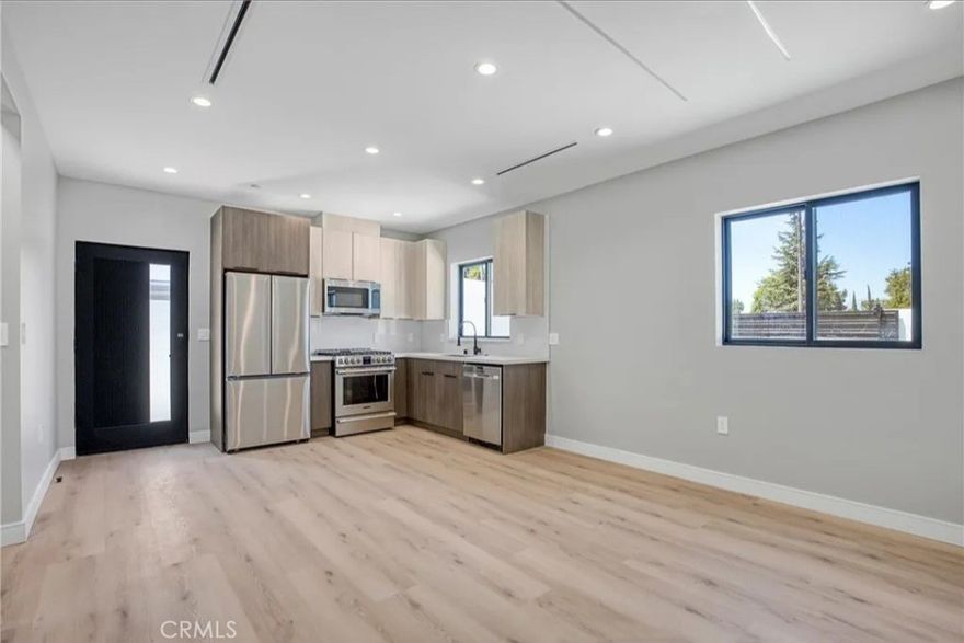 Welcome to this beautiful brand new unit located on a secure gated single family property in Winnetka. This thoughtfully designed home offers privacy, comfort, and modern living in a quiet residential setting.

The unit features its own separate address, separate gated entrance, and a private yard that is not shared with the main house. Large windows with custom window shutters and premium built in lighting fill the space with natural brightness throughout the day. Inside you will find a full size kitchen with stainless steel appliances including a refrigerator, gas range, microwave hood, dishwasher, and under cabinet lighting. Additional features include central air conditioning, a private laundry room with a washer and dryer, a bedroom with built in bedside and closet lighting, and a modern bathroom with a backlit LED vanity mirror.

The layout is efficient, contemporary, and finished with quality materials to create a clean and inviting atmosphere. Gas is included in the monthly rent up to a reasonable usage limit of thirty dollars.
The property is located close to neighborhood shopping, parks, schools, and public transit, providing convenient access to daily needs while maintaining a peaceful residential environment. The separate address, private yard, gated access, and ample street parking all contribute to convenient and comfortable living.