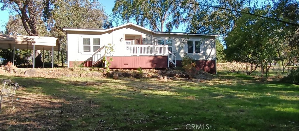 Nice  home with 3 bedrooms and 2 full baths in Paradise on 1.63 acres. Property is within walking distance to the Aquatic Park. Property has a pond with outside seating areas for your enjoyment. Fruit trees and Bamboo.