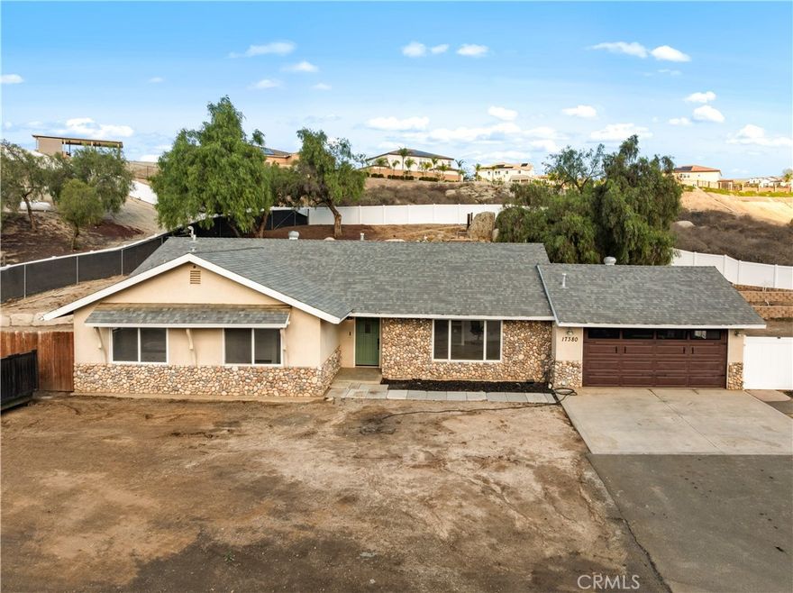 Rarely does a property like this become available in the highly desirable Mockingbird Canyon area. This unique four-bedroom, two-bath single-story home combines rural charm, modern upgrades, and wide-open usable land, making it a amazing opportunity for those seeking privacy, space, and the ultimate indoor-outdoor lifestyle.







As you pull in through the gated driveway, a year-round stream and private bridge create a peaceful first impression.



 Over $45,000 in new vinyl fencing surrounds the grounds, which include a large gated side yard and expansive flat space ideal for RVs, boats, or off-road toys. The property is zoned for agriculture, making it perfect for horse enthusiasts or those dreaming of a backyard farm, and there is plenty of room to build an ADU, barn, or custom workshop.



The home has been remodeled , including a brand-new farmhouse style kitchen and bathrooms, fresh paint throughout. All-new door hardware, lighting. Outside, the septic has been certified and has new leach lines, new water heater, and new 500 gallon propane tank. 



The outdoor amenities are just as impressive, featuring a rock waterfall pool with two levels — a spa-style pool for two above and a larger nine-person pool below, it's a great back yard for entertaining. 



With low taxes, no HOA, and a location that provides both seclusion and convenience just minutes from the city, this property offers unmatched flexibility and potential. Whether you are looking for a private homestead, income opportunities with an ADU, or simply the peace and quiet of country living, this Mockingbird Canyon gem is a truly rare find.