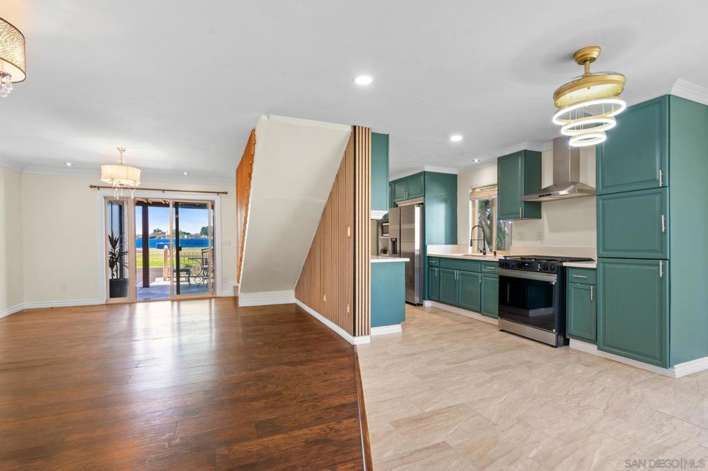 Welcome to this beautifully updated 3-bedroom, 2-bath townhouse offering 1,222 sq. ft. of stylish living in the desirable Evergreen community. Flooded with natural light, the home features fresh interior paint, new fixtures, new appliances and laminate hardwood flooring throughout. Thoughtful details include custom slat accents along the staircase and beneath, dual-paned windows, and modern finishes in the kitchen and baths. The primary suite is a true retreat with a clawfoot soaking tub and striking tile accent wall. Outside, enjoy an oversized yard and patio with new fencing, plus an outdoor storage area for added convenience. The private location provides a peaceful setting, while community amenities include a pool and playground. Just minutes from I-5 and I-905, this home blends comfort, style, and accessibility.