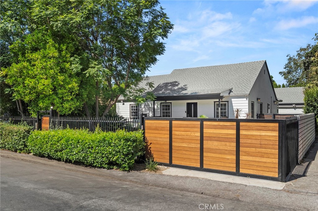 Come see this beautiful remodeled, gated sanctuary in Prime Valley Village! Offering nearly 2,000 sqft. of luxurious living space, plus a private bachelor suite with its own bathroom. Comes with APPROVED PLANS to build - 2 beds/2 baths, 905 sqft ADU! Step inside to a seamless open floor plan where the living room, dining area, den, and chef’s kitchen blend effortlessly. The gourmet kitchen boasts stainless steel appliances, a spacious center island, and designer finishes perfect for both cooking and entertaining.
Your primary retreat features direct backyard access, a generous walk-in closet, and a spa-inspired en-suite bath. Outside, the expansive backyard offers ample space for a pool, surrounded by lush fruit trees — an entertainer’s dream.
This move-in-ready home comes with numerous upgrades, including a newer roof, electrical panel, plumbing, and central A/C. The guesthouse with a private bath offers versatile options for visitors, an office, or creative studio space. A two-car garage ensures plenty of parking and storage.
With quick freeway access, your weekend getaways are effortless. This exceptional residence combines comfort, style, and convenience.Minutes from Disney, Warner Brothers, NBC, CBS, Universal Studios, and the famed NoHo Arts District, plus close proximity to houses of worship, transportation, shopping, and more.
