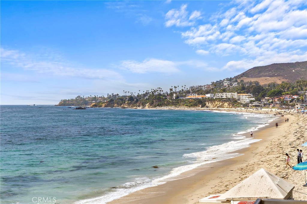 UNFURNISHED~Incredible Oceanfront downtown location. Resort-style living in the heart of Laguna Village. Light and bright with granite, tile floors with in-ceiling LED lights, in-wall cable, and below-floor insulation. Gorgeous balcony directly over the water with panoramic ocean, coastline and Catalina Island views. Walk to restaurants, shops and downtown. Hear the waves and watch them crash! Covered parking and laundry, and beach storage… .. glass panel deck feels like you are floating over the water.