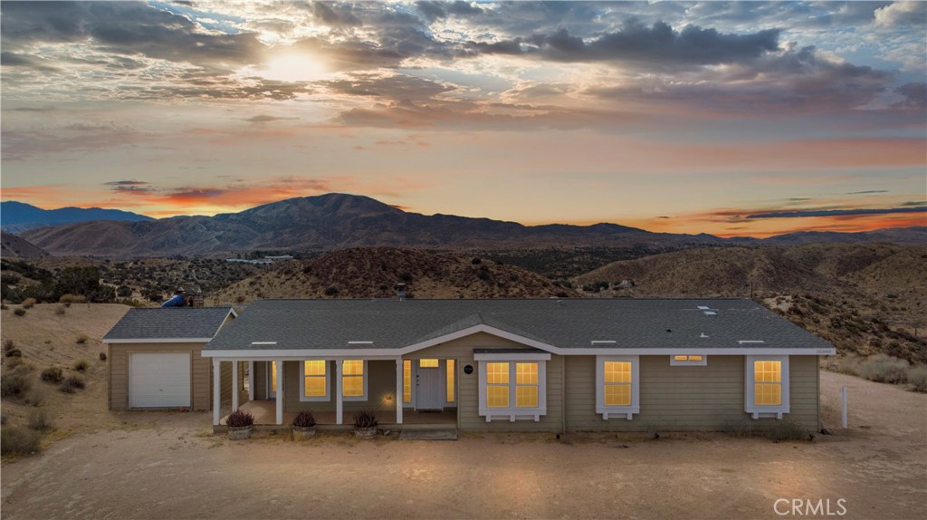 Stunning Views & Endless Potential! This private ranch-style retreat offers 4 spacious bedrooms + den, 3 baths, and a luxurious primary suite with a sitting nook. Enjoy multiple living areas, a cozy fireplace, and a large kitchen with walk-in pantry—perfect for gatherings. The expansive lot provides room for kids, pets, RV, and all your toys, plus space to customize. Relax, entertain, and soak in breathtaking sunsets—your dream home awaits!