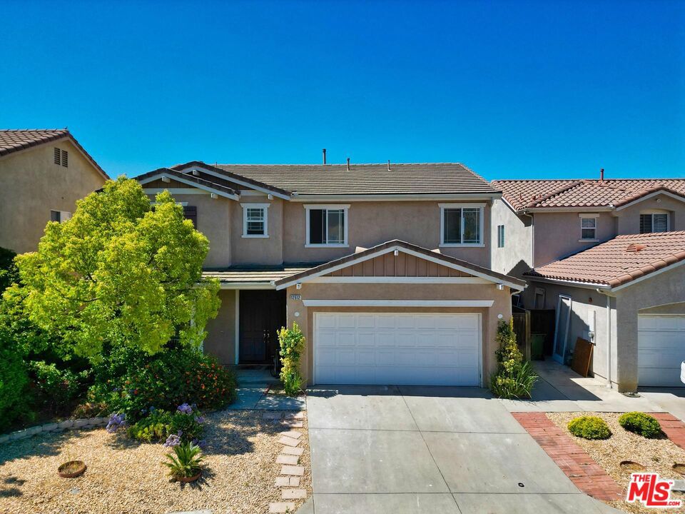 MUST SEE! This gorgeous gated 4 Beds + 2.5 Baths + big loft space community home features so much for the price. This home features panoramic view of the mountains and city lights. This home features a large loft area upstairs to use as a 2nd family room or even a large office area. This home also has an open kitchen with a large island and stainless steel appliances. It also features laminate floors, brand new carpet, updated bathrooms, lots of cabinets, updated fireplace, ceiling fans. This beautiful home shows bright due to all the windows throughout the home and where the home sits. There are built in cabinets in the garage for organized space in the 2 car garage. This community includes, security patrol, community pool, spa, basketball court, playground and BBQ area. Conveniently located near the 210,118,5,405 fwys.