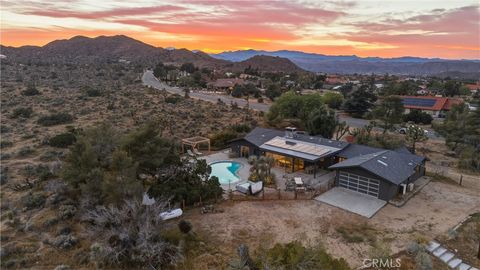 Photo of 58747 San Marino Dr, Yucca Valley, CA 92284 (MLS # JT26070628)