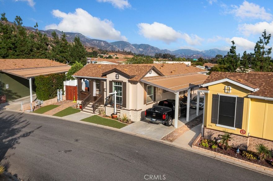 Beautiful, manufactured home built in 2015 with 3 bedrooms, 2 bathrooms, plenty of parking space, a laundry room for washer and dryer hook ups. Home has been well kept & it is ready for you to make it your home. Owners have enjoyed it for years & I'm sure you will too. The park also offers a banquet hall, a community Swimming pool and basketball court.
