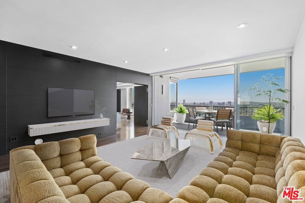 Live in the most coveted building complete with unparalleled amenities and jaw dropping 270-degree city views. This newly available corner unit offers spacious living areas with high quality appliances and fixtures throughout. Pietra gray marble in the kitchen and den. Spa-like baths with Calcutta marble, wood floors, in-unit washer-dryer, and Fleetwood windows to enjoy unobstructed panoramic views. Building amenities include 24/7 security, concierge, valet parking, tennis court, gym, rooftop pool, banquet room and dog park.
