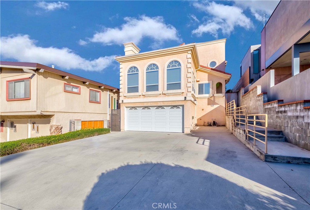 a stunning home in one of South Pasadena's most prestigious neighborhoods and award winning school district. This exquisite three-level residence boasts 5 bedrooms, 3.5 baths, and spans 3,387 sq. ft. This beautifully upgraded house including the brand new wood-like flooring throughout, new interior paint, along with a fully remodeled kitchen and bathrooms featuring top-of-the-line finishes. The bright, airy living room with skylight flows seamlessly into the brand-new kitchen, equipped with new cabinets and premium appliances. Modern vanities in every bathroom. Step outside to a spacious, with viewed backyard perfect for entertaining, 2 car attached garage with ample additional parking spaces. Separate laundry room. Extra storage area in lower level. A true gem offering luxury and convenience in an unbeatable location.