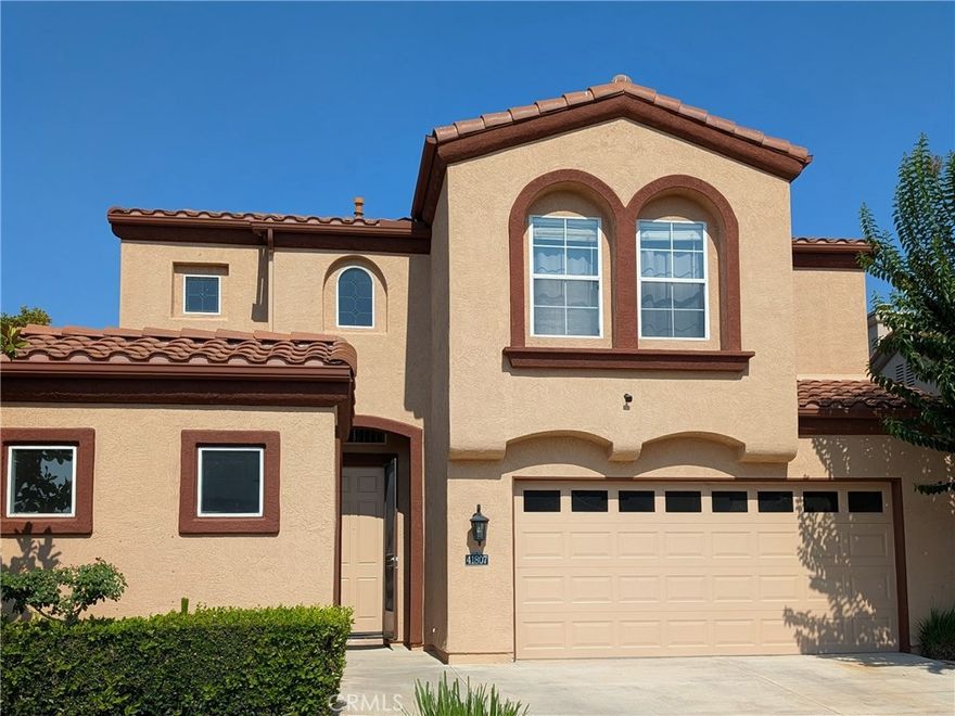 Welcome to the prestigious golf course community of Temeku Hills. Offering 4 Bedrooms & 3 full Bathrooms. A Bedroom & Full Bathroom DOWNSTAIRS is a Unique feature. A New Air Conditioner & New Carpet are recent upgrades. This gorgeous home is nestled in a quiet cul-de-sac & conveniently located across the street from the Clubhouse. Full club privileges include a Junior Olympic-sized pool, Fitness Center, Tennis  Courts, Clubhouse Events & more. Features include a Refrigerator, Washer & Dryer, Built in Microwave, a 2-car Attached Garage & an additional Detached Garage for a Golf Cart / Storage........The owner is providing a Gardener.......No Pets.....No Smokers