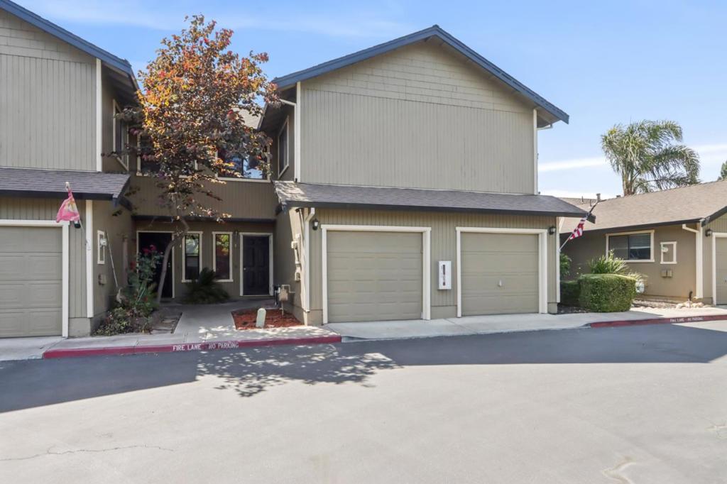 Opportunity awaits with this 3-bedroom, 2.5 bath townhome located in a desirable gated community. Enjoy the added peace, privacy, and sense of exclusivity that comes with gated living offering limited access to residents and their guests only. The open-concept living and dining area is filled with natural light and features a sliding door that opens to a private backyard retreat ideal for relaxing or entertaining. The kitchen is also bright and welcoming, ready for your personal updates. All three spacious bedrooms are located upstairs, providing a functional layout. With easy access to Highways 25 and 156, commuting to work, school, or shopping is simple and convenient. Just minutes from downtown Hollister, schools, and everyday amenities, this home offers great potential for the right buyer to create something special.